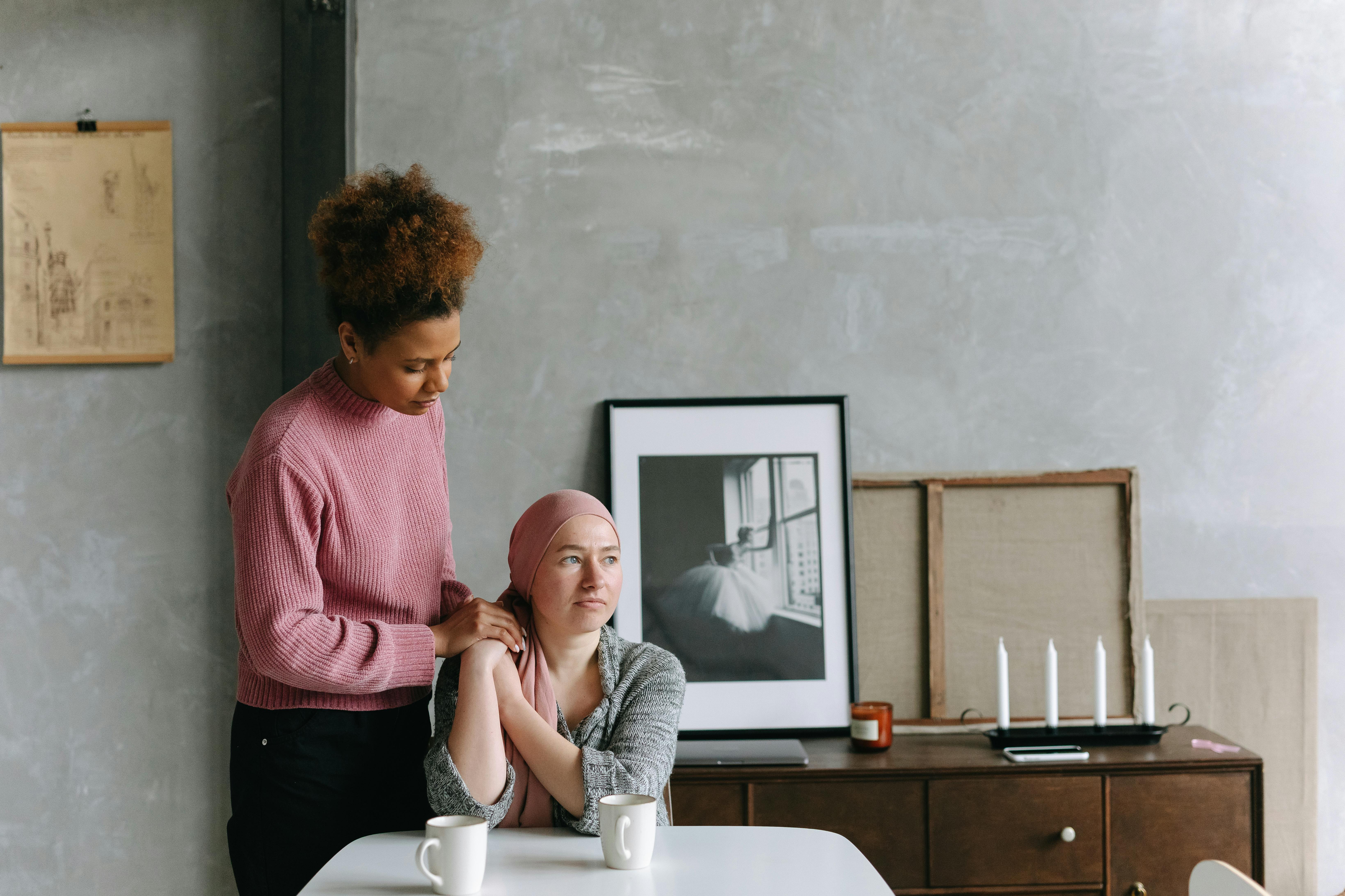 Friend consoles their Friend with cancer