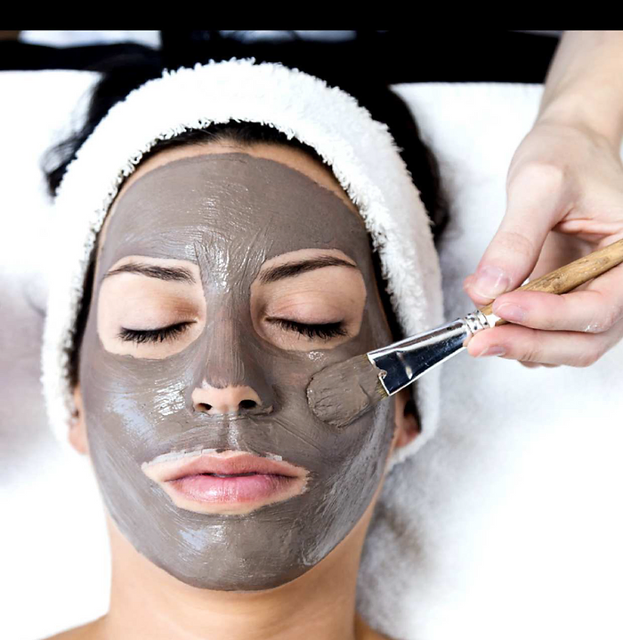 A woman practicing self care.