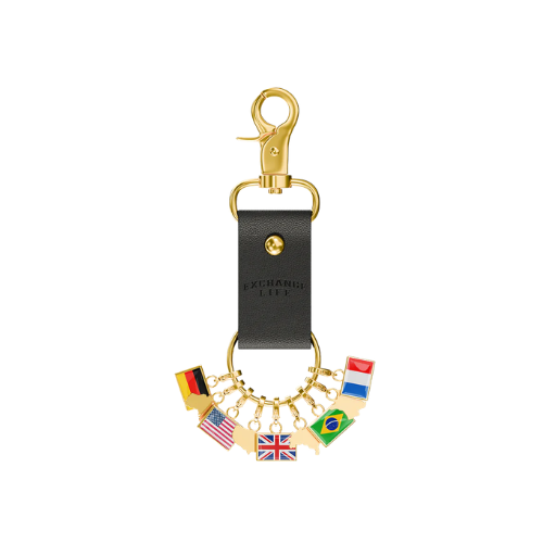 A black leather keychain with a gold clip, featuring a circular design with various miniature national flags including Germany, the United States, the United Kingdom, Brazil, and the Netherlands.