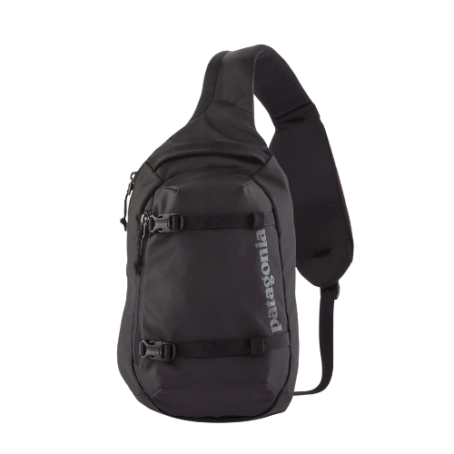 Black Patagonia sling backpack with multiple zippered compartments and an adjustable strap.