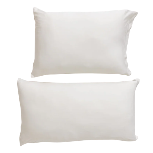 Two Piper and Mint's Drier Nights Pillowcases on two plain white pillows stacked on top of each other.