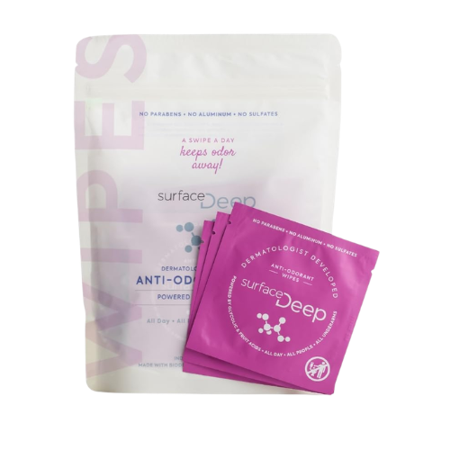 Pack of surface deep anti-odor wipes with individual sachets, featuring a purple design and text emphasizing its dermatologist-developed formula and absence of parabens, aluminum, and sulfates.